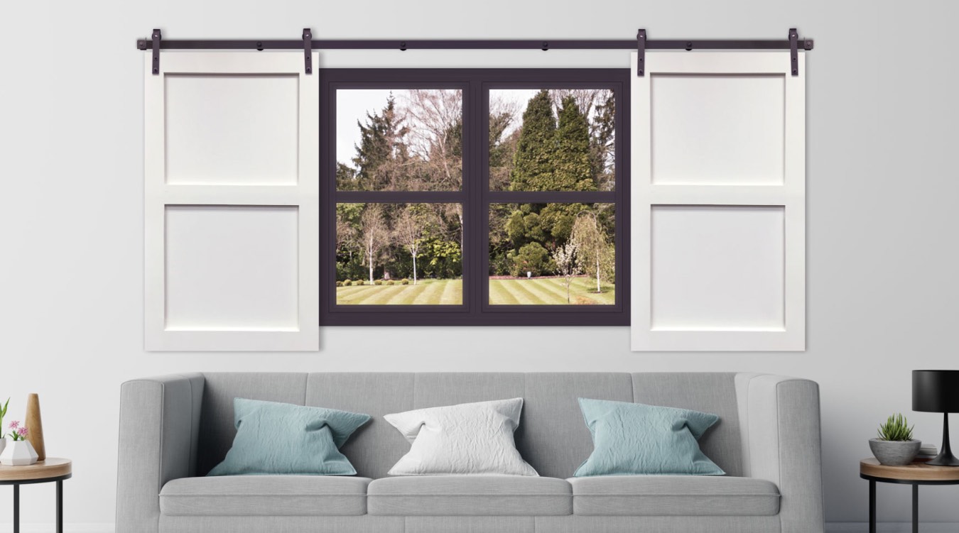 White barn door shutter in streamlined Tampa living room